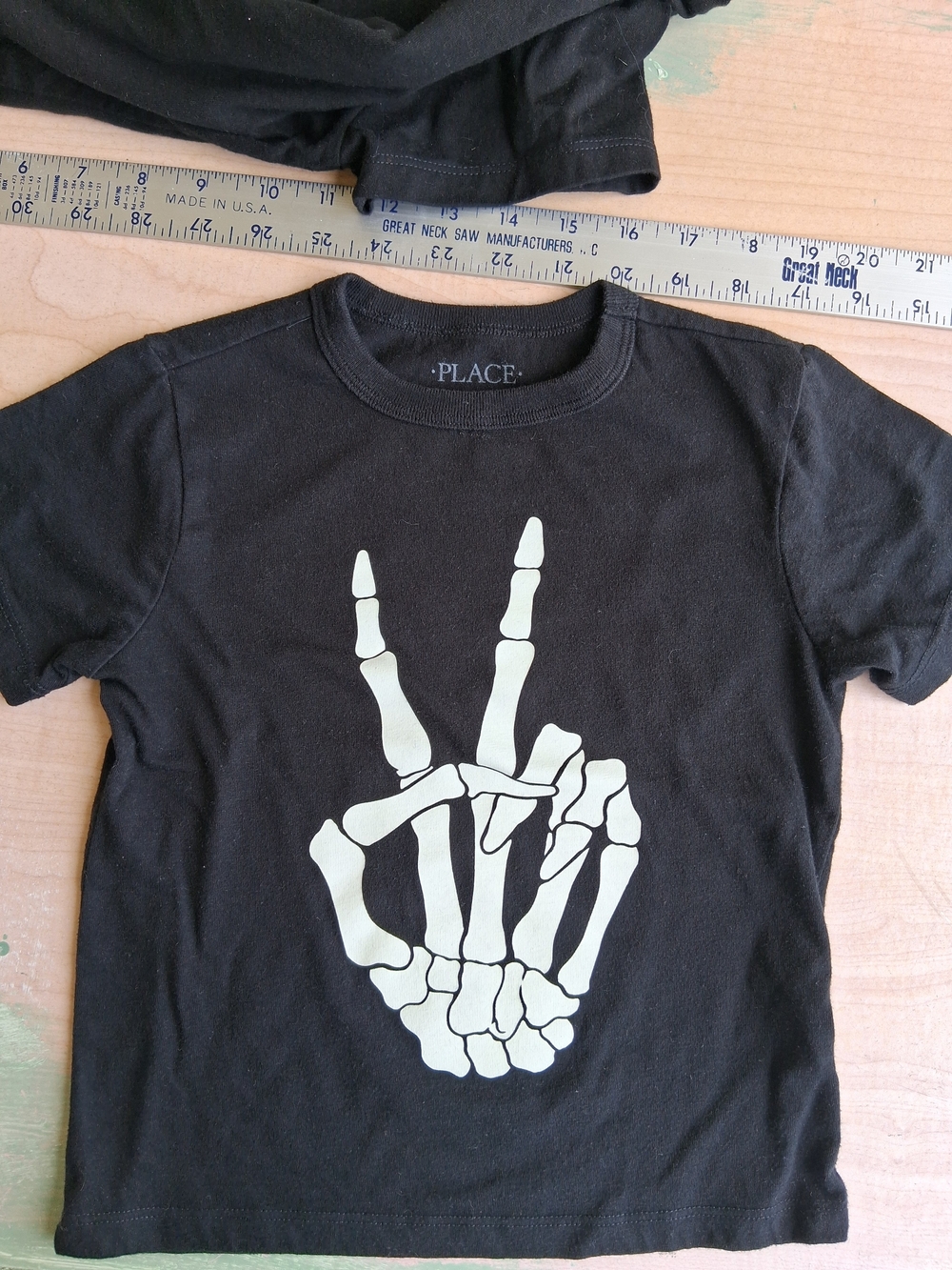 Halloween Tee with White Skeleton Peace Hand Graphic
